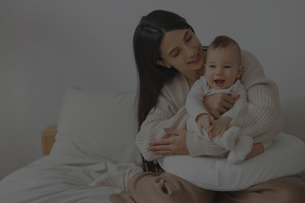 front-view-mother-holding-newborn-baby