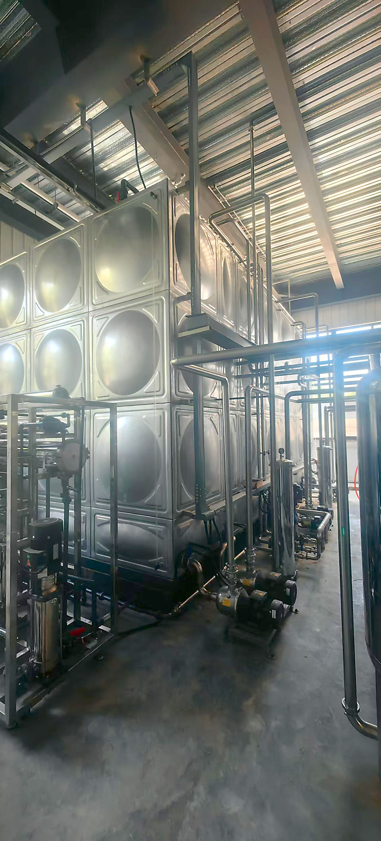 Overview of the industrial water tank and pipeline system.